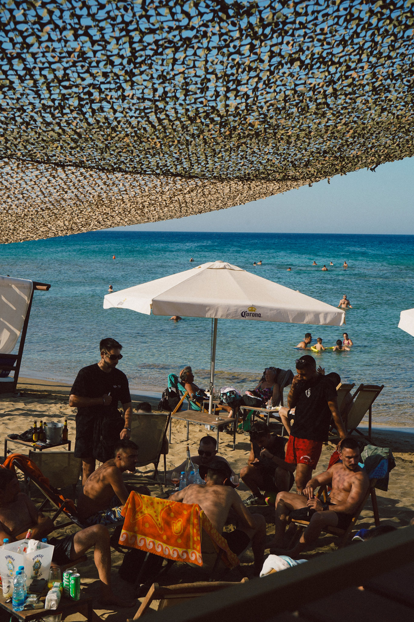 Beach hangout under shade net